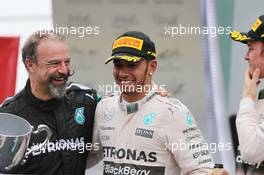 The podium (L to R): Jimmy Waddell (GBR) Mercedes AMG F1 Composite Inspector; Lewis Hamilton (GBR) Mercedes AMG F1, second; Nico Rosberg (GER) Mercedes AMG F1, race winner. 15.11.2015. Formula 1 World Championship, Rd 18, Brazilian Grand Prix, Sao Paulo, Brazil, Race Day.