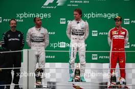 1st place Nico Rosberg (GER) Mercedes AMG F1 W06, with 2nd place Lewis Hamilton (GBR) Mercedes AMG F1 W06 and 3rd place Sebastian Vettel (GER) Ferrari. 15.11.2015. Formula 1 World Championship, Rd 18, Brazilian Grand Prix, Sao Paulo, Brazil, Race Day.