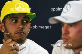 (L to R): Lewis Hamilton (GBR) Mercedes AMG F1 and team mate Nico Rosberg (GER) Mercedes AMG F1 in the FIA Press Conference. 15.11.2015. Formula 1 World Championship, Rd 18, Brazilian Grand Prix, Sao Paulo, Brazil, Race Day.