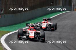 Alexander Rossi (USA), Manor F1 Team and Will Stevens (GBR), Manor F1 Team  15.11.2015. Formula 1 World Championship, Rd 18, Brazilian Grand Prix, Sao Paulo, Brazil, Race Day.