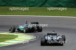 Nico Rosberg (GER) Mercedes AMG F1 W06 leads team mate Lewis Hamilton (GBR) Mercedes AMG F1 W06. 15.11.2015. Formula 1 World Championship, Rd 18, Brazilian Grand Prix, Sao Paulo, Brazil, Race Day.