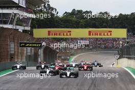 Nico Rosberg (GER) Mercedes AMG F1 W06 leads team mate Lewis Hamilton (GBR) Mercedes AMG F1 W06 at the start of the race. 15.11.2015. Formula 1 World Championship, Rd 18, Brazilian Grand Prix, Sao Paulo, Brazil, Race Day.