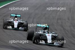 Nico Rosberg (GER), Mercedes AMG F1 Team and Lewis Hamilton (GBR), Mercedes AMG F1 Team  15.11.2015. Formula 1 World Championship, Rd 18, Brazilian Grand Prix, Sao Paulo, Brazil, Race Day.