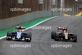 Felipe Nasr (BRA), Sauber F1 Team and Pastor Maldonado (VEN), Lotus F1 Team  15.11.2015. Formula 1 World Championship, Rd 18, Brazilian Grand Prix, Sao Paulo, Brazil, Race Day.