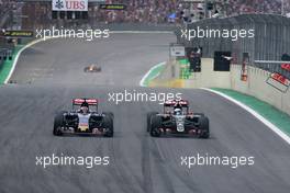 Romain Grosjean (FRA), Lotus F1 Team and Max Verstappen (NL), Scuderia Toro Rosso  15.11.2015. Formula 1 World Championship, Rd 18, Brazilian Grand Prix, Sao Paulo, Brazil, Race Day.