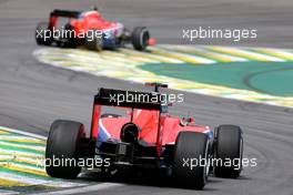 Alexander Rossi (USA), Manor F1 Team and Will Stevens (GBR), Manor F1 Team  15.11.2015. Formula 1 World Championship, Rd 18, Brazilian Grand Prix, Sao Paulo, Brazil, Race Day.