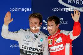 Nico Rosberg (GER), Mercedes AMG F1 Team, Sebastian Vettel (GER), Scuderia Ferrari  14.11.2015. Formula 1 World Championship, Rd 18, Brazilian Grand Prix, Sao Paulo, Brazil, Qualifying Day.