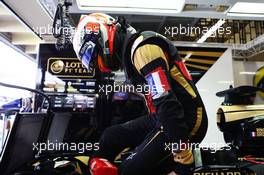 Romain Grosjean (FRA) Lotus F1 E23 wears a Tricolore as a mark of respect to the vctims of the Paris terrorist attacks. 14.11.2015. Formula 1 World Championship, Rd 18, Brazilian Grand Prix, Sao Paulo, Brazil, Qualifying Day.