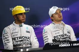 (L to R): Lewis Hamilton (GBR) Mercedes AMG F1 with team mate Nico Rosberg (GER) Mercedes AMG F1 in the post qualifying FIA Press Conference. 14.11.2015. Formula 1 World Championship, Rd 18, Brazilian Grand Prix, Sao Paulo, Brazil, Qualifying Day.