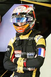 Romain Grosjean (FRA) Lotus F1 Team wears a Tricolore as a mark of respect to the vctims of the Paris terrorist attacks. 14.11.2015. Formula 1 World Championship, Rd 18, Brazilian Grand Prix, Sao Paulo, Brazil, Qualifying Day.