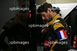 Romain Grosjean (FRA) Lotus F1 Team wears a Tricolore as a mark of respect to the vctims of the Paris terrorist attacks. 14.11.2015. Formula 1 World Championship, Rd 18, Brazilian Grand Prix, Sao Paulo, Brazil, Qualifying Day.