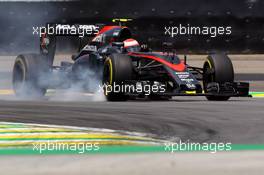 Jenson Button (GBR) McLaren MP4-30 locks up under braking. 14.11.2015. Formula 1 World Championship, Rd 18, Brazilian Grand Prix, Sao Paulo, Brazil, Qualifying Day.