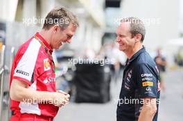(L to R): James Allison (GBR) Ferrari Chassis Technical Director with Paul Monaghan (GBR) Red Bull Racing Chief Engineer. 15.11.2015. Formula 1 World Championship, Rd 18, Brazilian Grand Prix, Sao Paulo, Brazil, Race Day.