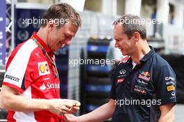 (L to R): James Allison (GBR) Ferrari Chassis Technical Director with Paul Monaghan (GBR) Red Bull Racing Chief Engineer. 15.11.2015. Formula 1 World Championship, Rd 18, Brazilian Grand Prix, Sao Paulo, Brazil, Race Day.