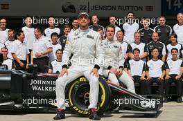 Jenson Button (GBR) McLaren and Stoffel Vandoorne (BEL) McLaren Test and Reserve Driver at a team photograph. 12.11.2015. Formula 1 World Championship, Rd 18, Brazilian Grand Prix, Sao Paulo, Brazil, Preparation Day.
