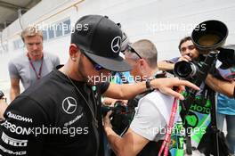 Lewis Hamilton (GBR) Mercedes AMG F1 arrives at the paddock. 12.11.2015. Formula 1 World Championship, Rd 18, Brazilian Grand Prix, Sao Paulo, Brazil, Preparation Day.