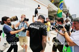 Lewis Hamilton (GBR) Mercedes AMG F1 arrives at the paddock. 12.11.2015. Formula 1 World Championship, Rd 18, Brazilian Grand Prix, Sao Paulo, Brazil, Preparation Day.