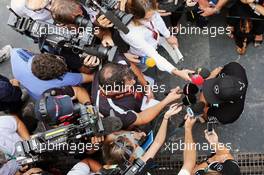 Lewis Hamilton (GBR) Mercedes AMG F1 with the media. 12.11.2015. Formula 1 World Championship, Rd 18, Brazilian Grand Prix, Sao Paulo, Brazil, Preparation Day.