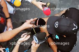 Lewis Hamilton (GBR) Mercedes AMG F1 with the media. 12.11.2015. Formula 1 World Championship, Rd 18, Brazilian Grand Prix, Sao Paulo, Brazil, Preparation Day.