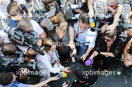 Lewis Hamilton (GBR) Mercedes AMG F1 with the media. 12.11.2015. Formula 1 World Championship, Rd 18, Brazilian Grand Prix, Sao Paulo, Brazil, Preparation Day.