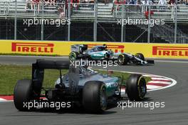 Lewis Hamilton (GBR) Mercedes AMG F1 W06 spins in the first practice session and is passed by Nico Rosberg (GER) Mercedes AMG F1 W06. 05.06.2015. Formula 1 World Championship, Rd 7, Canadian Grand Prix, Montreal, Canada, Practice Day.