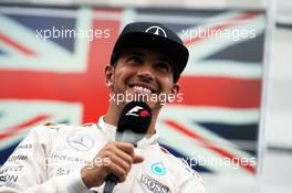 Race winner Lewis Hamilton (GBR) Mercedes AMG F1 on the podium. 07.06.2015. Formula 1 World Championship, Rd 7, Canadian Grand Prix, Montreal, Canada, Race Day.