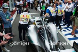 The Mercedes AMG F1 W06 of Lewis Hamilton (GBR) Mercedes AMG F1 W06 leaves parc ferme. 07.06.2015. Formula 1 World Championship, Rd 7, Canadian Grand Prix, Montreal, Canada, Race Day.