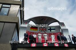 The podium (L to R): Nico Rosberg (GER) Mercedes AMG F1, second; Lewis Hamilton (GBR) Mercedes AMG F1, race winner; Valtteri Bottas (FIN) Williams, third. 07.06.2015. Formula 1 World Championship, Rd 7, Canadian Grand Prix, Montreal, Canada, Race Day.