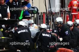 Fernando Alonso (ESP) McLaren MP4-30 makes a pit stop. 07.06.2015. Formula 1 World Championship, Rd 7, Canadian Grand Prix, Montreal, Canada, Race Day.