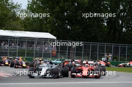 Nico Rosberg (GER) Mercedes AMG F1 W006 leads at the start of the race. 07.06.2015. Formula 1 World Championship, Rd 7, Canadian Grand Prix, Montreal, Canada, Race Day.
