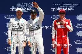 Qualifying top three in parc ferme (L to R): Nico Rosberg (GER) Mercedes AMG F1, second; Lewis Hamilton (GBR) Mercedes AMG F1, pole position; Kimi Raikkonen (FIN) Ferrari, third. 06.06.2015. Formula 1 World Championship, Rd 7, Canadian Grand Prix, Montreal, Canada, Qualifying Day.