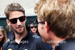 (L to R): Romain Grosjean (FRA) Lotus F1 Team with Nico Rosberg (GER) Mercedes AMG F1 on the drivers parade. 07.06.2015. Formula 1 World Championship, Rd 7, Canadian Grand Prix, Montreal, Canada, Race Day.
