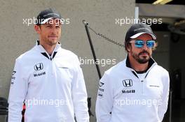 (L to R): Jenson Button (GBR) McLaren with team mate Fernando Alonso (ESP) McLaren. 07.06.2015. Formula 1 World Championship, Rd 7, Canadian Grand Prix, Montreal, Canada, Race Day.