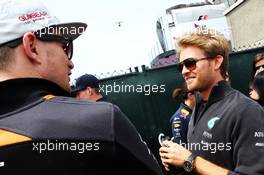 (L to R): Nico Hulkenberg (GER) Sahara Force India F1 with Nico Rosberg (GER) Mercedes AMG F1 on the drivers parade. 07.06.2015. Formula 1 World Championship, Rd 7, Canadian Grand Prix, Montreal, Canada, Race Day.