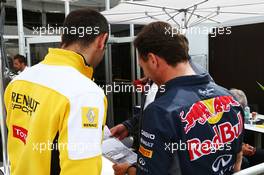 (L to R): Cyril Abiteboul (FRA) Renault Sport F1 Managing Director with Christian Horner (GBR) Red Bull Racing Team Principal. 07.06.2015. Formula 1 World Championship, Rd 7, Canadian Grand Prix, Montreal, Canada, Race Day.