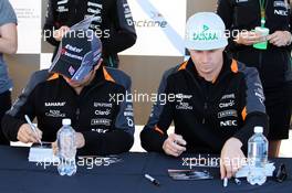 (L to R): Sergio Perez (MEX) Sahara Force India F1 and team mate Nico Hulkenberg (GER) Sahara Force India F1 sign autographs for the fans. 04.06.2015. Formula 1 World Championship, Rd 7, Canadian Grand Prix, Montreal, Canada, Preparation Day.