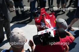 Ferrari fan with a car on his head. 04.06.2015. Formula 1 World Championship, Rd 7, Canadian Grand Prix, Montreal, Canada, Preparation Day.