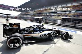 Sergio Perez (MEX) Sahara Force India F1 VJM08 leaves the pits. 10.04.2015. Formula 1 World Championship, Rd 3, Chinese Grand Prix, Shanghai, China, Practice Day.