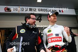(L to R): Julien Simon-Chautemps (FRA) Lotus F1 Team Race Engineer with Romain Grosjean (FRA) Lotus F1 Team. 10.04.2015. Formula 1 World Championship, Rd 3, Chinese Grand Prix, Shanghai, China, Practice Day.