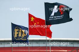 F1, Chinese and FIA flags. 10.04.2015. Formula 1 World Championship, Rd 3, Chinese Grand Prix, Shanghai, China, Practice Day.