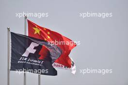 Chinese and F1 flags. 10.04.2015. Formula 1 World Championship, Rd 3, Chinese Grand Prix, Shanghai, China, Practice Day.