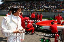Roberto Merhi (ESP) Manor Marussia F1 Team on the grid. 12.04.2015. Formula 1 World Championship, Rd 3, Chinese Grand Prix, Shanghai, China, Race Day.