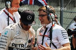Lewis Hamilton (GBR) Mercedes AMG F1 with Peter Bonnington (GBR) Mercedes AMG F1 Race Engineer. 12.04.2015. Formula 1 World Championship, Rd 3, Chinese Grand Prix, Shanghai, China, Race Day.