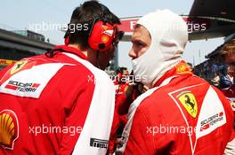 Sebastian Vettel (GER) Ferrari on the grid. 12.04.2015. Formula 1 World Championship, Rd 3, Chinese Grand Prix, Shanghai, China, Race Day.