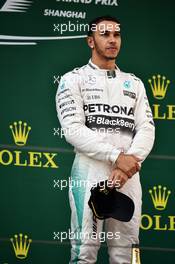 Race winner Lewis Hamilton (GBR) Mercedes AMG F1 on the podium. 12.04.2015. Formula 1 World Championship, Rd 3, Chinese Grand Prix, Shanghai, China, Race Day.