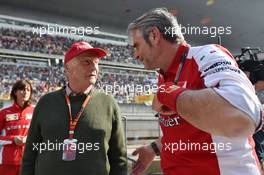 (L to R): Niki Lauda (AUT) Mercedes Non-Executive Chairman with Maurizio Arrivabene (ITA) Ferrari Team Principal. 12.04.2015. Formula 1 World Championship, Rd 3, Chinese Grand Prix, Shanghai, China, Race Day.