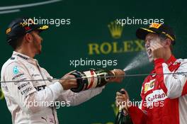 1st place Lewis Hamilton (GBR) Mercedes AMG F1 and 3rd place Sebastian Vettel (GER) Ferrari. 12.04.2015. Formula 1 World Championship, Rd 3, Chinese Grand Prix, Shanghai, China, Race Day.