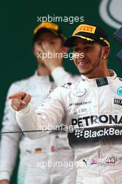 1st place Lewis Hamilton (GBR) Mercedes AMG F1 with 2nd place Nico Rosberg (GER) Mercedes AMG F1 W06. 12.04.2015. Formula 1 World Championship, Rd 3, Chinese Grand Prix, Shanghai, China, Race Day.