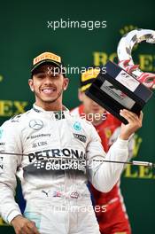 Race winner Lewis Hamilton (GBR) Mercedes AMG F1 celebrates on the podium. 12.04.2015. Formula 1 World Championship, Rd 3, Chinese Grand Prix, Shanghai, China, Race Day.