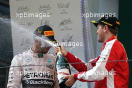Lewis Hamilton (GBR), Mercedes AMG F1 Team and Sebastian Vettel (GER), Scuderia Ferrari  12.04.2015. Formula 1 World Championship, Rd 3, Chinese Grand Prix, Shanghai, China, Race Day.